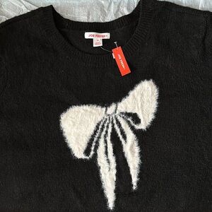 Fuzzy black sweater with bow design NWT